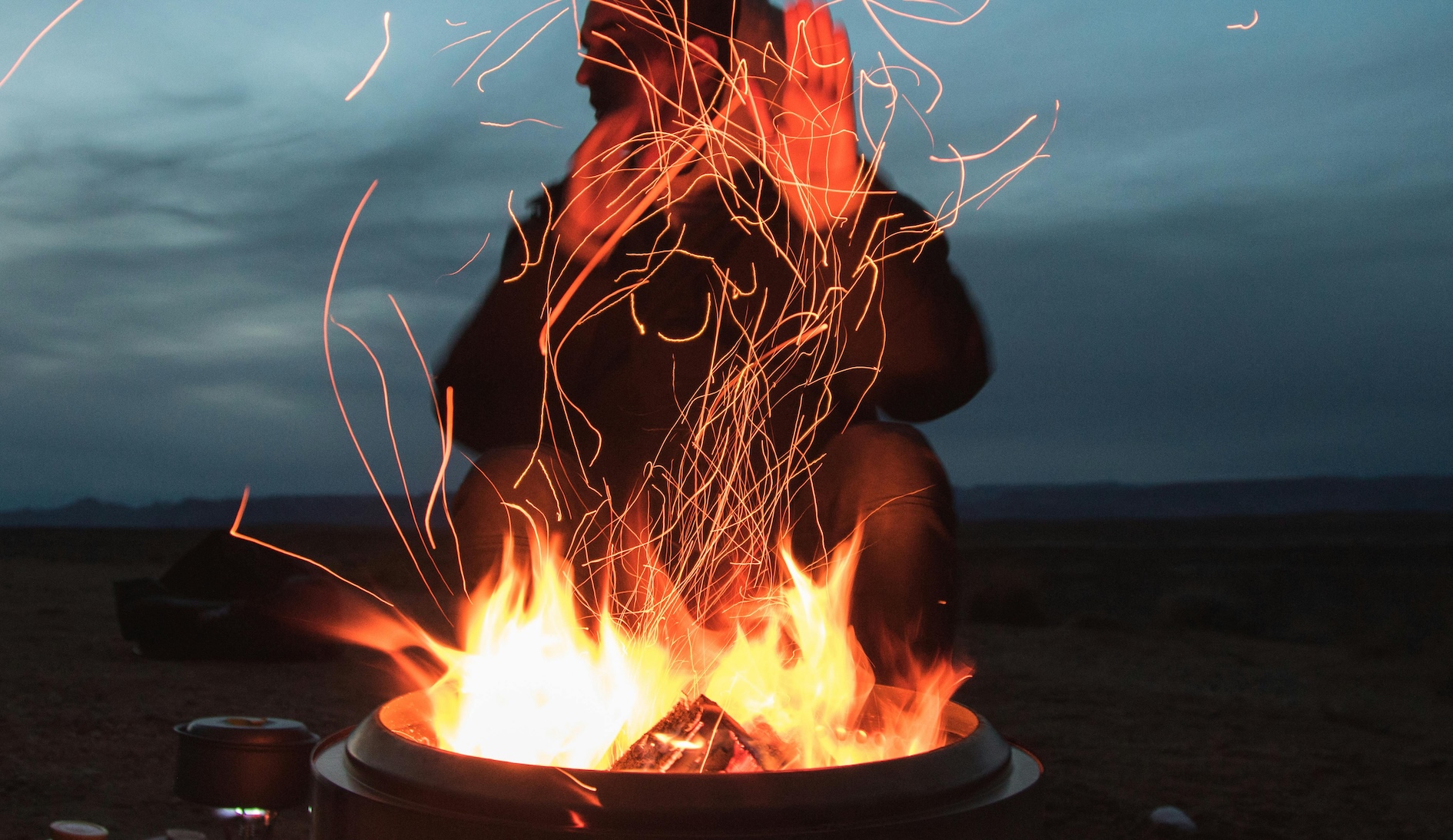 One ember glowing in darkness, symbolizing healing and potential.